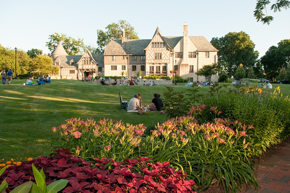 Festival goers picnic at Ewing Manor