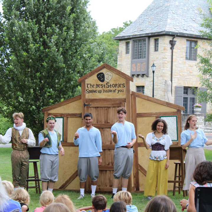 actors performing for a group of children